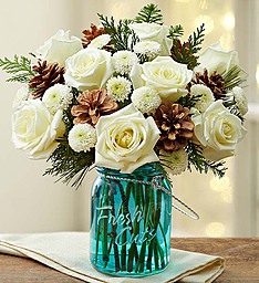 Wintry in Blue Winter Blooms in Blue Jardiniere in Gainesville, FL | PRANGE'S FLORIST- Sara & Lilli V