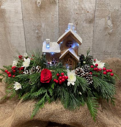 Christmas Cottage Centerpiece seasonal greenery arrangement with lit up house