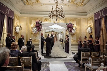 Chuppah with purple flowers Ceremony  