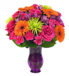 "COLOR EXPLOSION"...(E)Bright flowers in pinks,orange, purples and lime greens arranged in a vase. (may be clear or a different color vase)