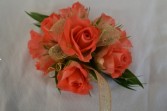 coral blossoms wrist corsage