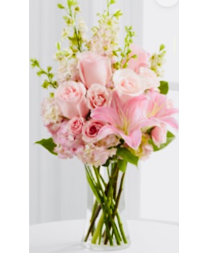 Core simplicity One sided with heights, lilies roses and stock flowers