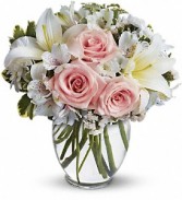 ROSE RADIANCE with red or pink roses 