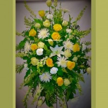 Cream and yellow garden Spray  Standing floral spray 