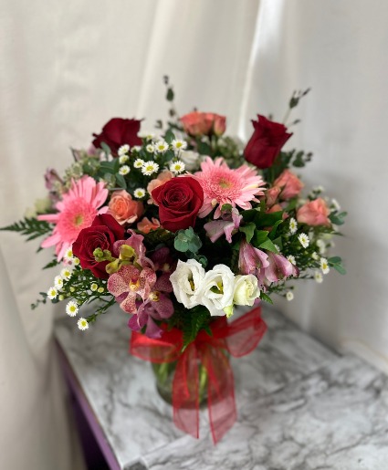 Cupids Delight Vase of pinks, reds, and whites