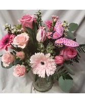 DELIGHTFULLY PINK WITH butterfly pick! (E) (Flowers will be pink but they could be a different variety and shades of pinks could be different depending on stock)