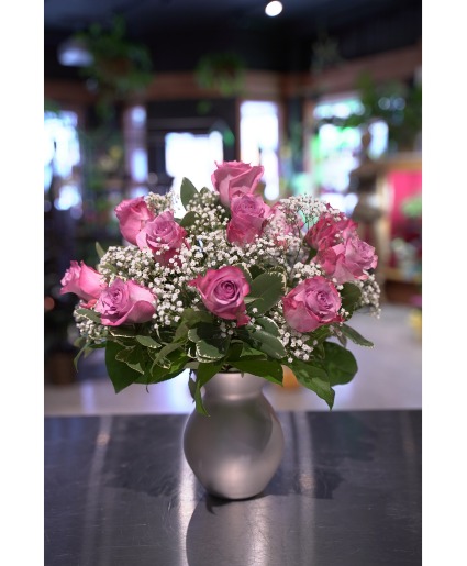 Dozen Lavender Roses  Vased With Baby's Breath