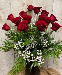 Dozen Red roses  in elegant glass vase