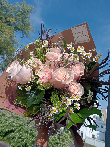 Dozen Roses Wrapped  Designer's Choice in Glastonbury, CT | THE FLOWER DISTRICT