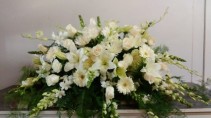 ENDURING LIGHT  CASKET SPRAY