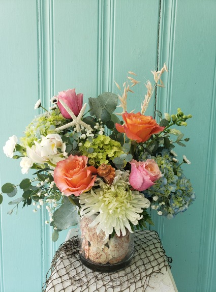 EVERYTHINGS BEACHY FLOWER ARRANGEMENT