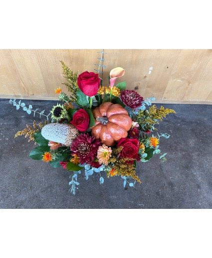Fall arrangement with a pumpkin 