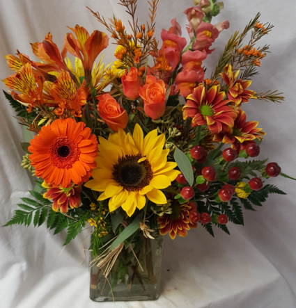 "Fall Blooms"..(F). fall flowers arranged in glass Vase