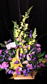 FLUTTERS OF SPRING basket arrangement