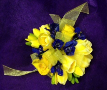 freesia and delphinium wrist corsage
