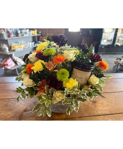 Fresh arrangement with a candle  