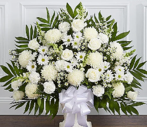 Funeral Basket: All white with bow FUNERAL BASKET MADE WITH DIFFERENT TYPES OF FLOWERS: Roses, carnations, etc, 