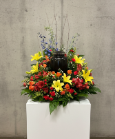 Funeral earn arrangement fall colors 