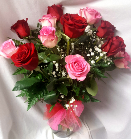 6 Red Roses and 6 Pink Roses arranged  (R) in a vase With filler!
