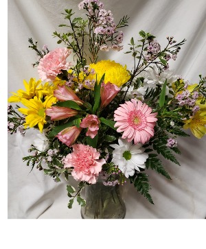 GARDEN LOOK ARRANGEMENT in a vase,  (S)    Mixture of seasonal flowers in stock.
