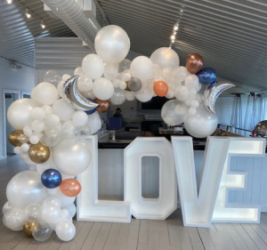 Garland Arch on stand with mylar accents 