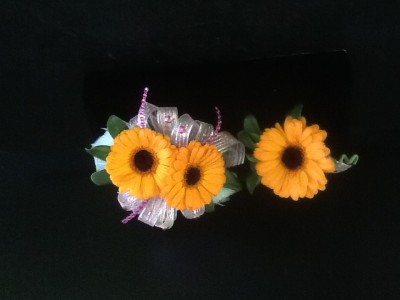 Gerbera Daisy   Wrist Corsage $50      Boutonniere $15