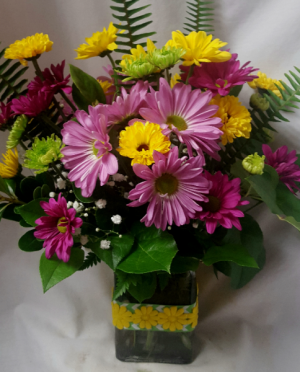"Colorful Daisy Bouquet"..(E).purple, lavender,  Yellow with lime green poms all arranged in a cute ribbon detailed rectangular vase with filler!