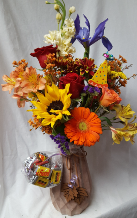  Autumn Delight...(F) ceramic Vase with  DANGLING FALL LEAVES..arranged with seasonal  flowers arranged with Birthday Pic and also comes with a small bag of miniature chocolates.