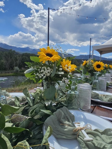 Golden Hour Gather Sun-kissed blooms and mountain views — the perfect rustic touch for your ‘I do’