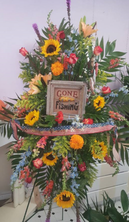 bouquet of fishing poles Gone Fishing funeral in Deer Park, TX