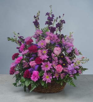 Gracious Lavender Basket       T235-1 Fresh Flower Basket Arrangement