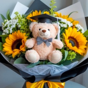 Graduation Bouquet: with bear teddy bear may be substituted with a different teddy bear depending on availability.