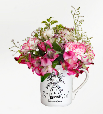 Grandma Variety of fresh cut flowers in a 16 oz. mug