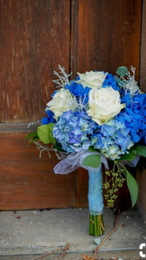  Hand Held Beautiful white roses and color enhanced hydengea and seeded euc.
