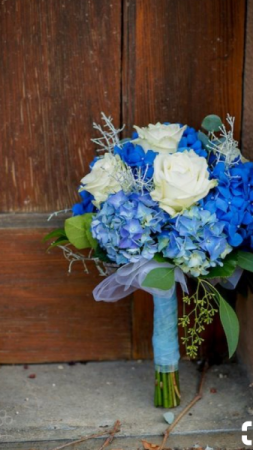  Hand Held Beautiful white roses and color enhanced hydengea and seeded euc.