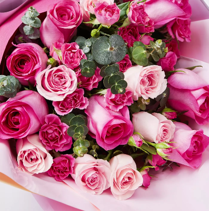 Hand Wrapped Mixed Loose Pink Roses Paper wrapped Bouquet