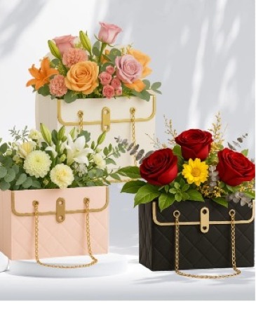 Handbag Blooms Floral Arrangement in Oakdale, NY | POSH FLORAL DESIGNS INC.