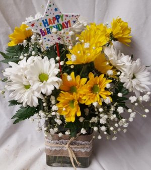 Happy Birthday Daisy arrangement. Yellow (B) and white daisies arranged in a cute ribbon detailed rectangular vase with baby's breath and Happy Birthday Pic!