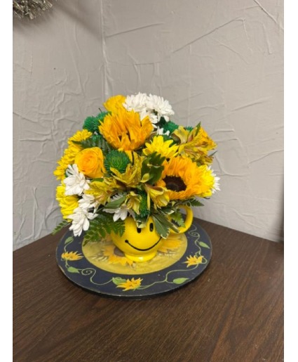 Happy face with sunflower vased