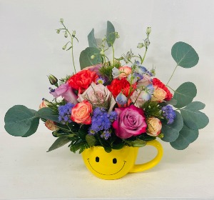 happy mug  fresh flowers