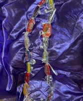 have a sweet graduation candy lei  perfect to say congrats