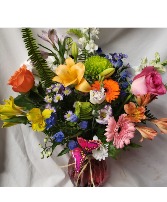 BUTTERFLY ARRANGEMENT...(E) mixed bright seasonal flowers in vase with a BUTTERFLY PIC(flowers may be different according to daily stock) 