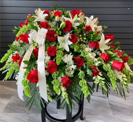 Red, Green, and White Casket Spray 