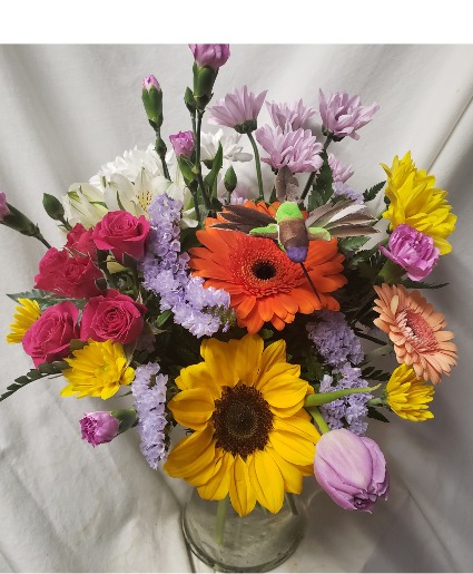 HUMMINGBIRD ARRANGEMENT...MIXED FLOWERS. (E) With hummingbird pick...flowers may vary depending on stock and seasonal