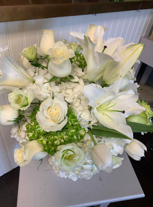 hydrangeas lillies and roses arrangements 