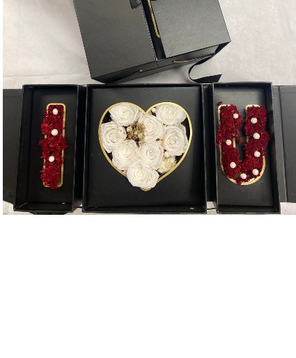 I love you more Preserved roses in a surprise keepsake box
