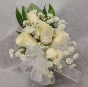 corsage with 5 sweetheart roses and   (CO) baby's breath with cream ribbon or any color ribbon