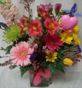 "FROM THE HEART"(VD)...Bright Mixed flowers   Arranged in a vase with heart pick.