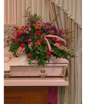 Ladies Top Choice Casket Spray Shown in pinks
