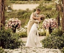 Large Urns  of assorted matching flowers 